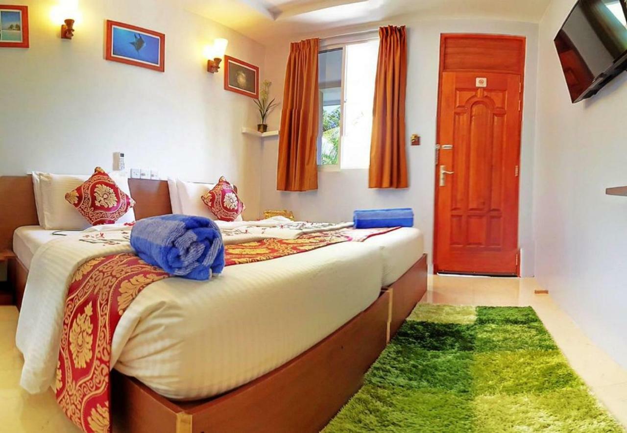Santa Rosa Maldives Thulusdhoo Quarto foto