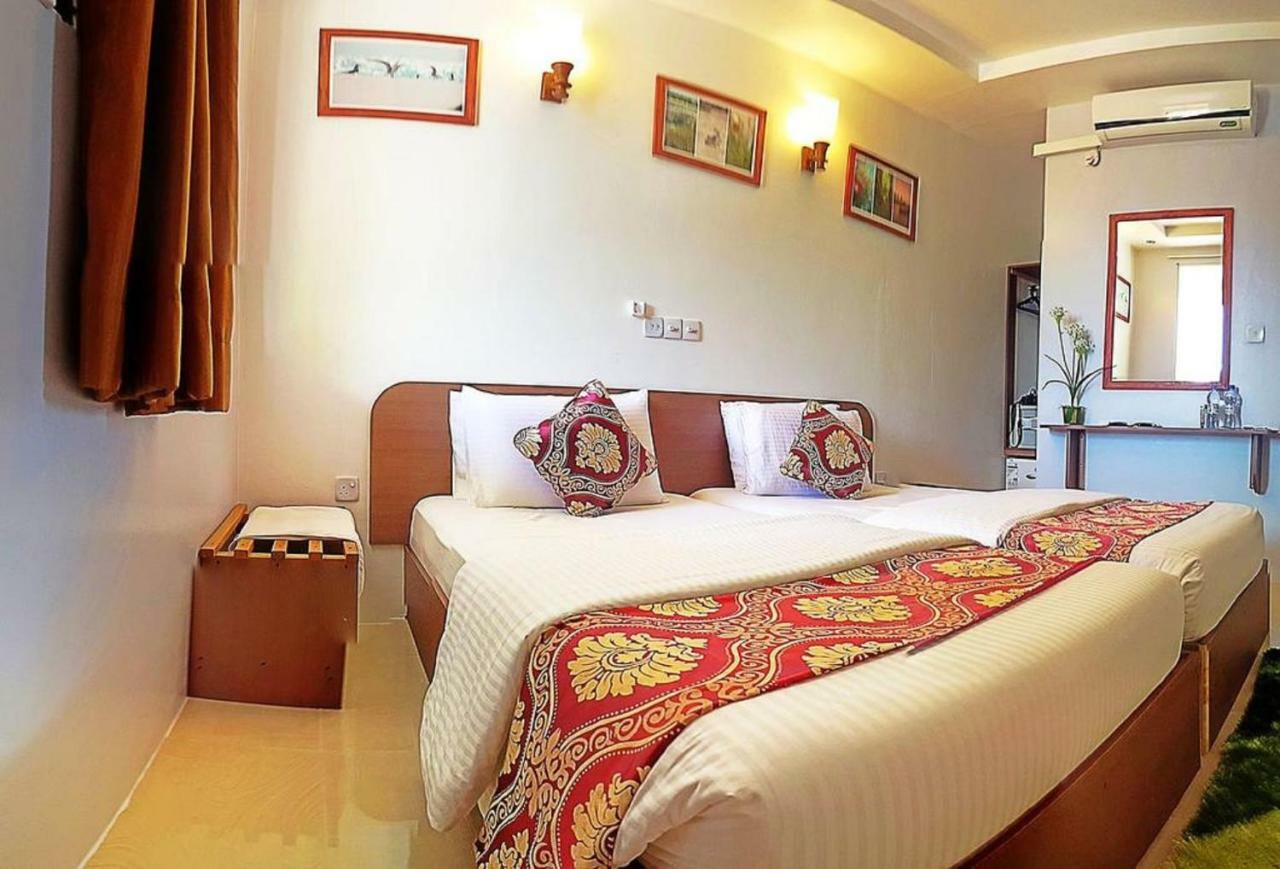 Santa Rosa Maldives Thulusdhoo Quarto foto