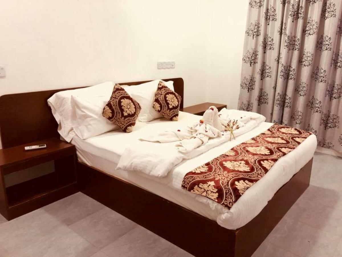 Santa Rosa Maldives Thulusdhoo Quarto foto